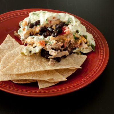 Baked 7-layer dip with pulled pork | Recipe Renovator