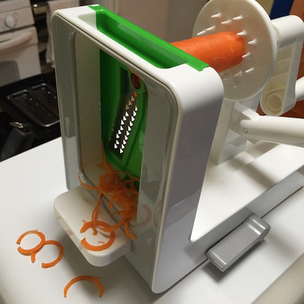 OXO spiralizer in action with the spaghetti cut blade #ad