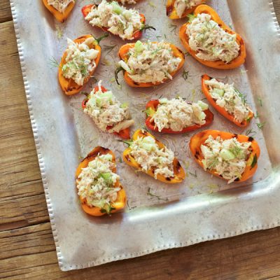 Crab stuffed bell peppers from Recipe Renovator. Super easy but fancy appetizer using fresh crab, dairy-free "cashew cream", and fresh herbs. Gluten-free, paleo, dairy-free.